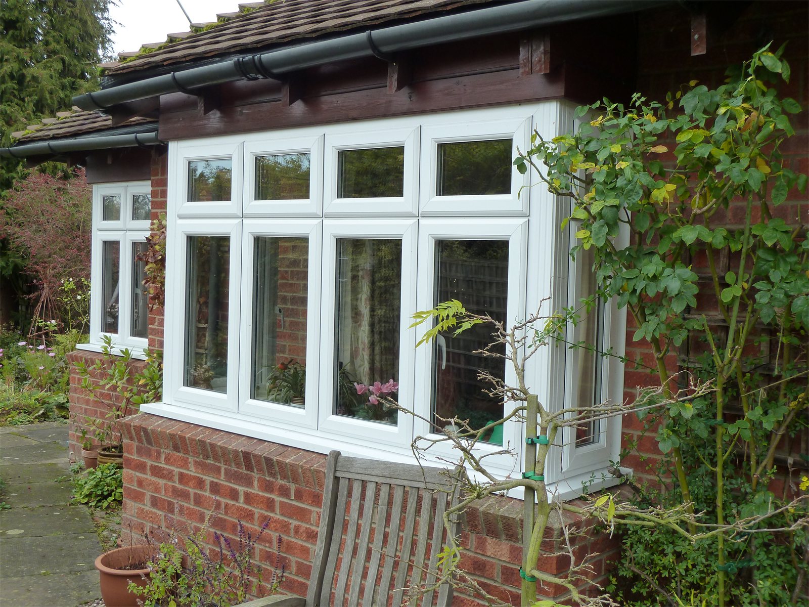 White uPVC bay window with top lights (product photo)