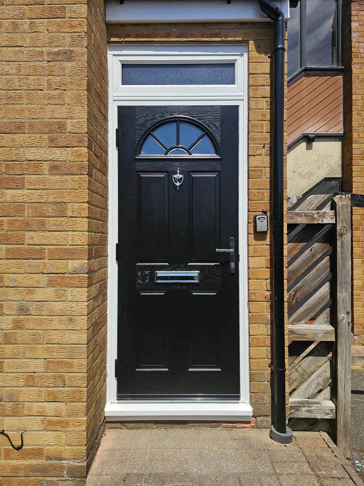 Black composite door with fanlight glass and top light, London, fitted by Termopane Windows
