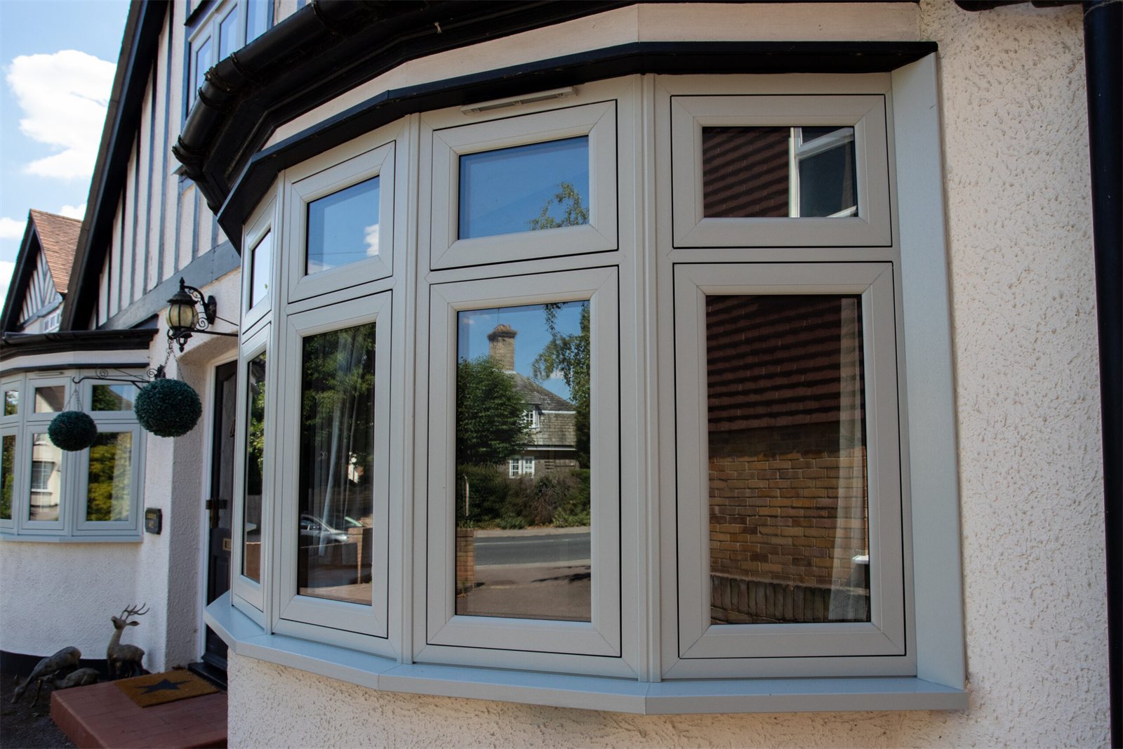 Sage flush sash bay window on a period house (product photo)