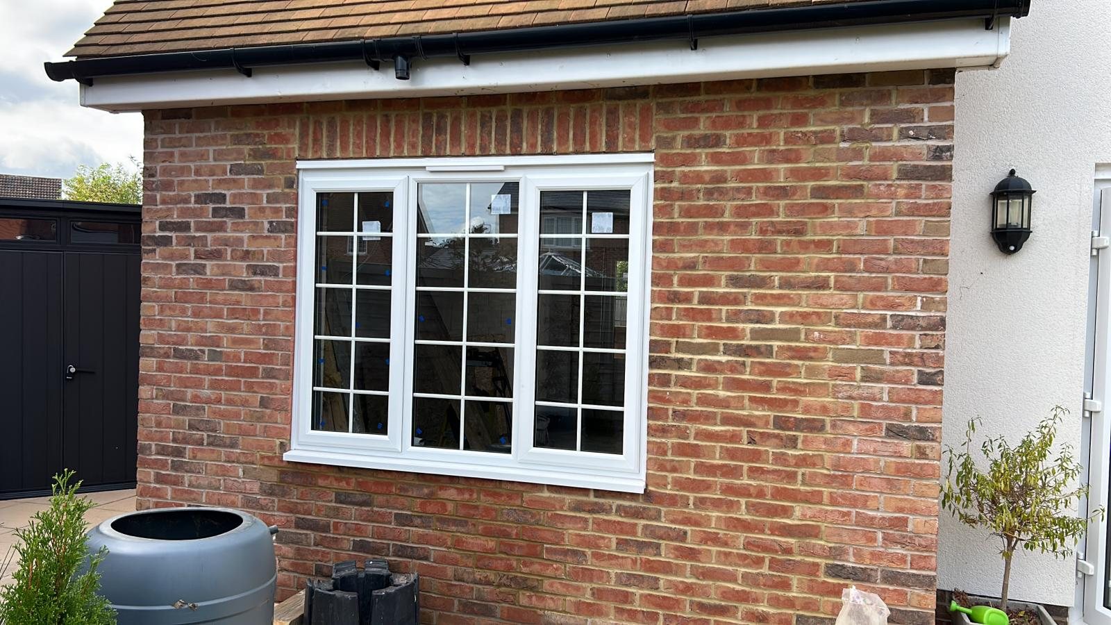 White uPVC casement windows with Georgian bars on an extension, London, fitted by Termopane Windows