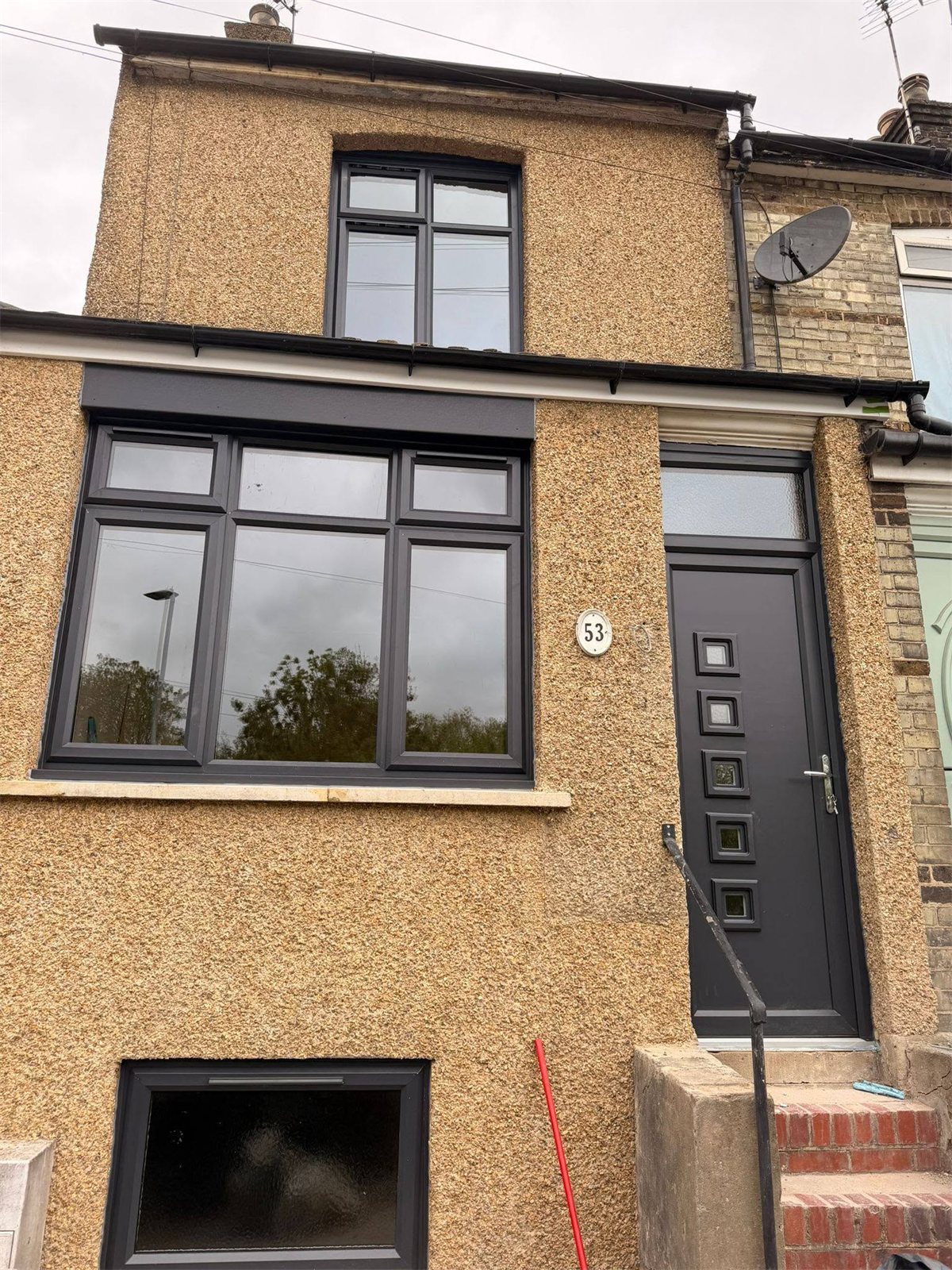 Anthracite grey casement windows and matching composite door, London, fitted by Termopane Windows