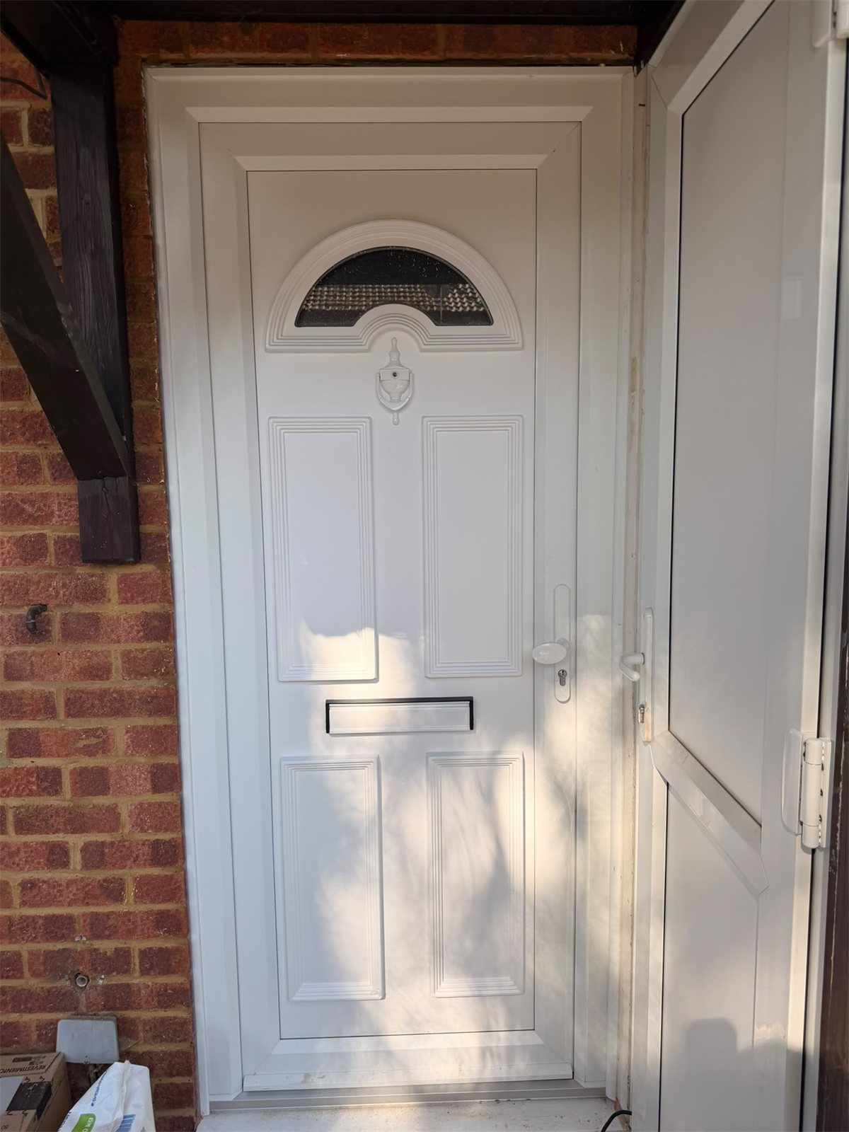 White uPVC front door and side panel, London, fitted by Termopane Windows