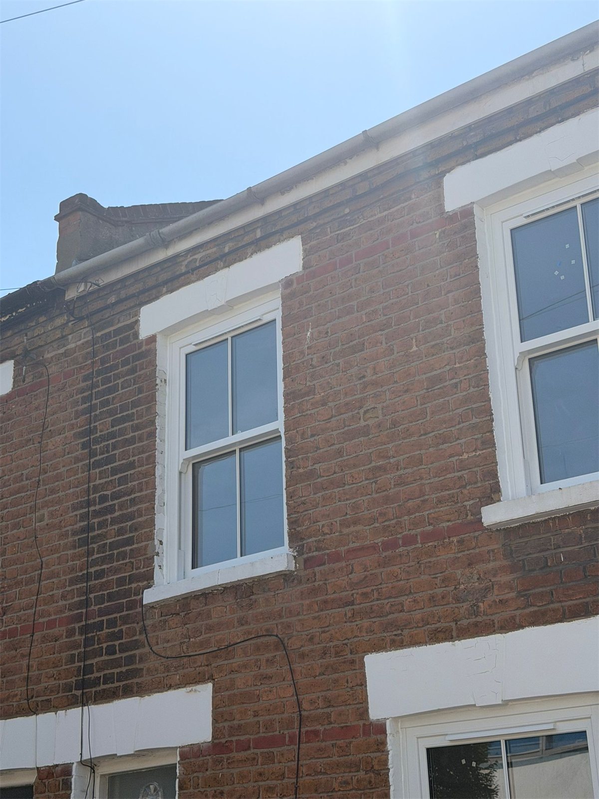 uPVC vertical sliding sash windows on a terrace, London, fitted by Termopane Windows