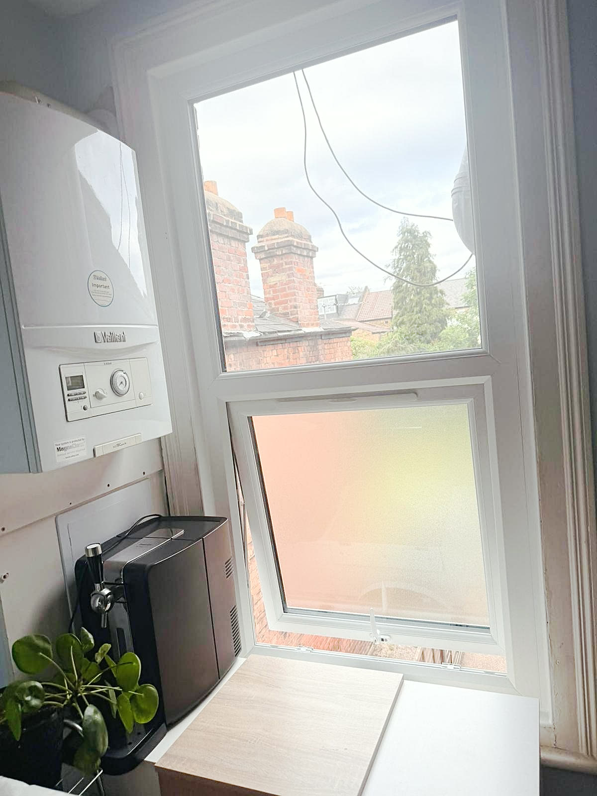 Kitchen window with an obscure lower pane, London, fitted by Termopane Windows