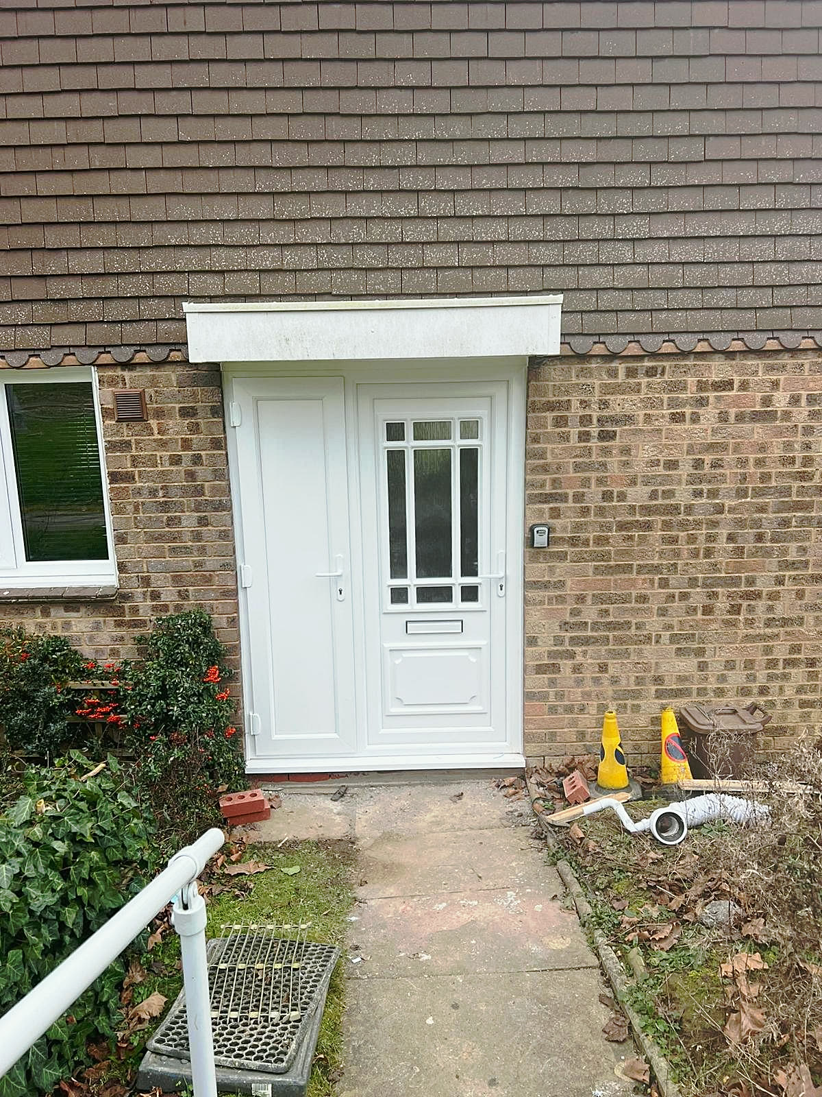White uPVC front door and side light, London, fitted by Termopane Windows