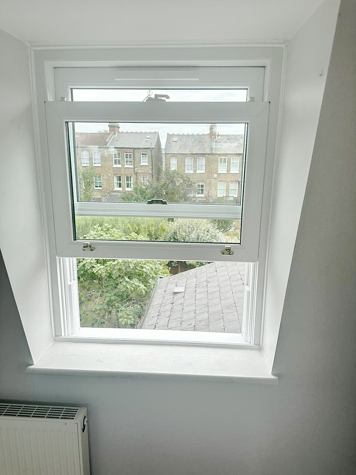 Vertical slider sash window in a dormer, London, fitted by Termopane Windows