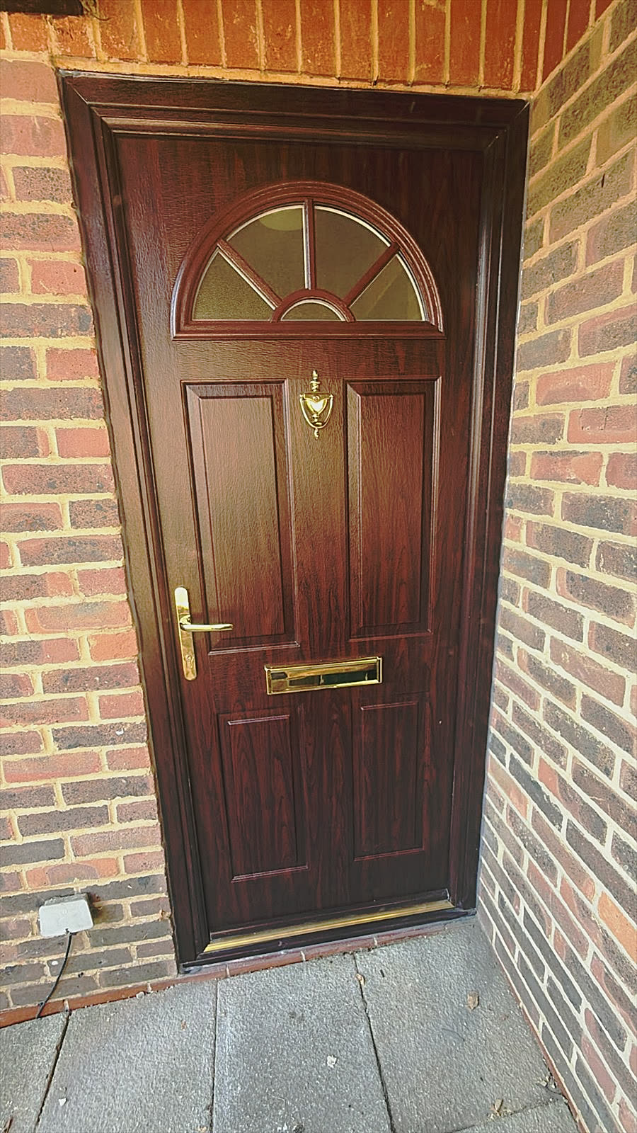Woodgrain composite front door, Woking, fitted by Termopane Windows